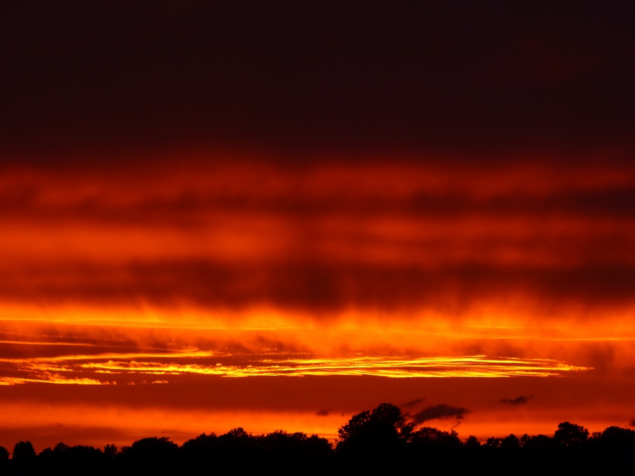 Sonnenuntergang ber Cottenau